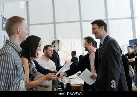 Job seekers attend the Fourth Annual NYC Startup Job Fair in New York Stock Photo