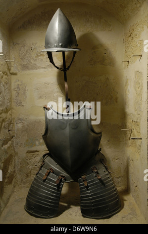 Gothic knight body plate armour displayed at Wignacourt Tower in Bugibba, Malta Stock Photo
