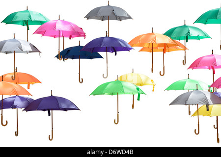 Many colorful umbrellas isolated on white background. Stock Photo