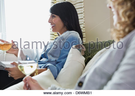 Side view of mature woman enjoying a house party