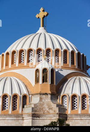 Church or monastery building detail against blue sky Stock Photo