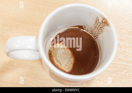 Empty cup of coffee with the word marriage in the bottom, concept about trying to predict the future via coffee fortune telling Stock Photo