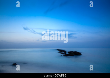 Blue sky and sea  shot at blue hour time of the day with long exposure and ND filter Stock Photo