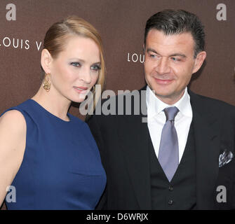 Munich, Germany. 23rd April, 2013. US actress Uma Thurman and Benoit-Louis Vuitton pose at the opening of a new store of the French fashion label Louis Vuitton in Munich, Germany, 23 April 2013. Photo: Ursula Dueren/dpa/Alamy Live News Stock Photo
