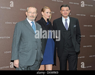 Chinese actress Gong Li, front center, Yves Carcelle, front second left,  Chairman and CEO of Louis Vuitton, Patrick Louis Vuitton, right, a  fifth-gene Stock Photo - Alamy