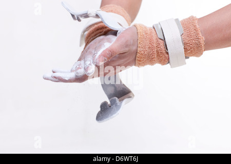 Gymnastic athlete with talcum powder Stock Photo