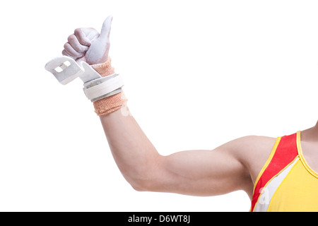 Gymnastic athlete doing thumbs up Stock Photo