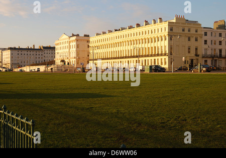 Regency houses on Brunswick Terrace just off seafront in Brighton.East Sussex. England. With evening light. Stock Photo