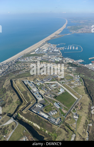 Aerial photograph of the Isle of Portland with Chesil Beach in the background. Stock Photo