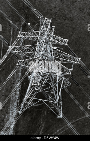 Black and white aerial photograph showing power lines and pylon