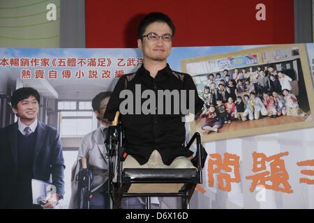 Japanese writer Hirotada Ototake  shared positive spirits with school kids in Taipei, Taiwan, China on Tuesday April 23, 2013. Stock Photo