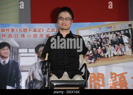 Japanese writer Hirotada Ototake  shared positive spirits with school kids in Taipei, Taiwan, China on Tuesday April 23, 2013. Stock Photo