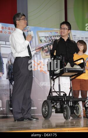 Japanese writer Hirotada Ototake  shared positive spirits with school kids in Taipei, Taiwan, China on Tuesday April 23, 2013. Stock Photo