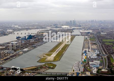 Aerial photograph of London City Airport looking towards Canary Wharf Stock Photo