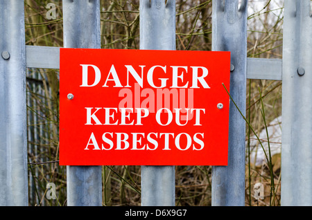 Red warning sign - Danger Keep Out Asbestos Stock Photo