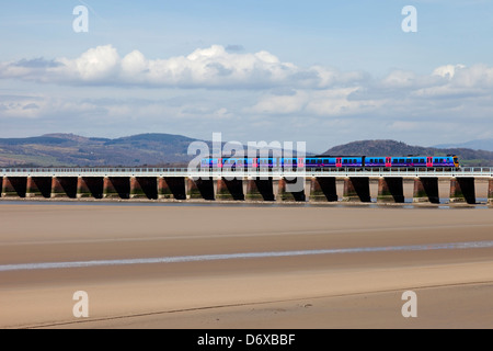 Trans Pennine Express Train Crossing the Kent Viaduct, Kent Estuary Arnside Cumbria UK Stock Photo
