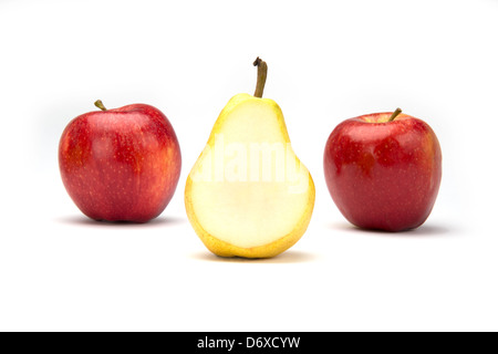Two Royal Gala apples and a cut Bartlet pear in the center Stock Photo