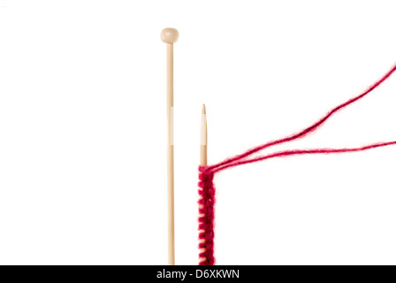 Wooden knitting needles and wool, cast on, isolated on white background Stock Photo