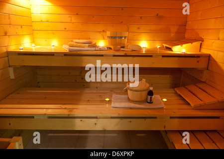 interior of a finnish sauna in candle light Stock Photo