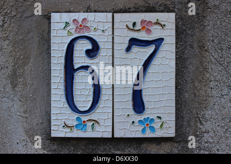 67 Tile numbered (door number) Stock Photo