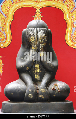 Thai giant amulet called Phra pidta mean closed eyes buddha Stock Photo