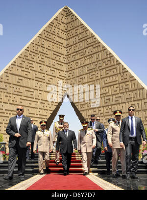 Cairo, Egypt. 24th April, 2013. A handout picture released by the Egyptian presidency shows Egypt's President Mohamed Morsi, Defence Minister Abdel Fattah al-Sissi and Egyptian Army Chief of Staff Major General Sedki Sobhi leaving after laying wreaths at the tomb of former President Anwar al-Sadat and the Tomb of the Unknown Soldier during the commemoration of Sinai Liberation Day in Cairo on April 24, 2013  (Credit Image: Credit:  Tareq Gabas/APA Images/ZUMAPRESS.com/Alamy Live News) Stock Photo