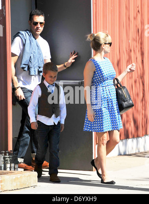 Reese Witherspoon, her son Deacon Phillippe and husband Jim Toth leave a church in Santa Monica Santa Monica, California - Stock Photo