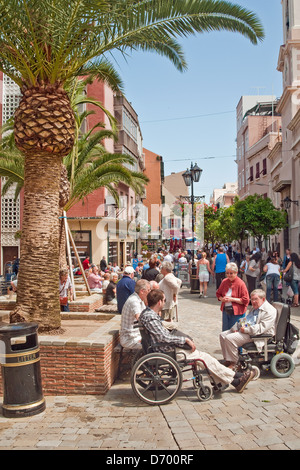 Tourists and local shoppers enjoying the sunshine in Main Street, Gibraltar Stock Photo