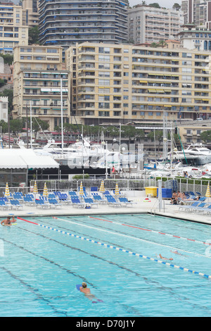 La Condamine, Monaco, swimming in the harbor district of La Condamine in Monaco Stock Photo