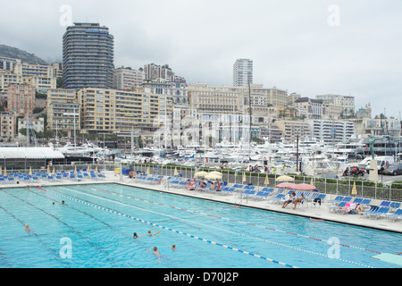 La Condamine, Monaco, swimming in the harbor district of La Condamine in Monaco Stock Photo