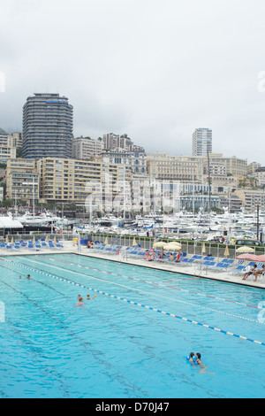 La Condamine, Monaco, swimming in the harbor district of La Condamine in Monaco Stock Photo