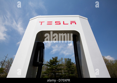 A Tesla electric vehicle Supercharging Station along Interstate 95 in Delaware.  Stock Photo