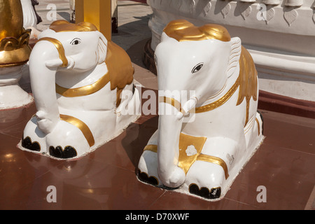 Two white elephant statues at Shwedagon Pagoda, Yangon, (Rangoon), Myanmar, (Burma) Stock Photo