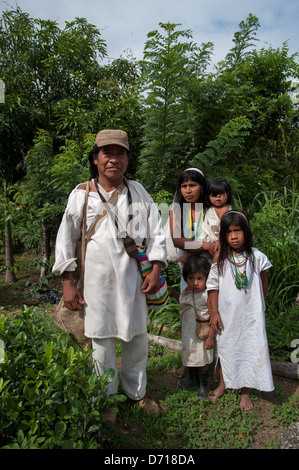 Family Of Kogui Indigenous People Near Tayrona National Park, Santa Marta, Colombia Stock Photo