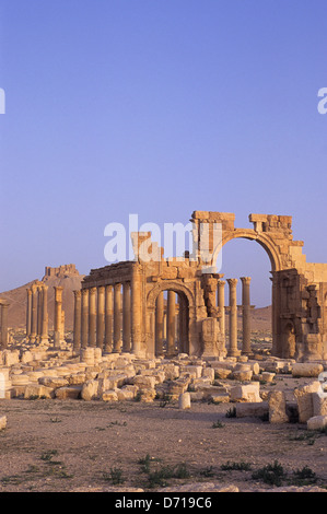 Syria, Palmyra, Ancient Roman City, Triumphal Arch And Colonnaded Street, Castle Stock Photo