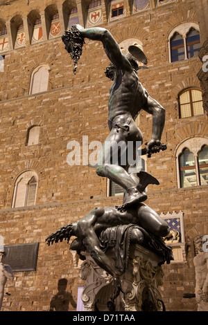 Palazzo Vecchio in Florence; Italy Illuminated at Night with the Perseus Sculpture by Cellini Stock Photo