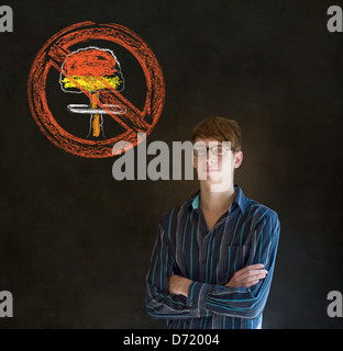 Business man, student, teacher or politician no nuclear bombs war pacifist thought thinking chalk cloud on blackboard background Stock Photo