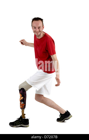 Male amputee showing the use of a prosthetic limb. Positive male amputee  showing his agility with the use of a prosthetic limb. Stock Photo