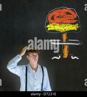 Business man, student or teacher with thought thinking chalk nuclear bomb cloud on blackboard background Stock Photo