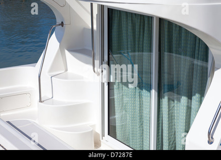 Stern on a luxury boat leading up to an upper deck Stock Photo