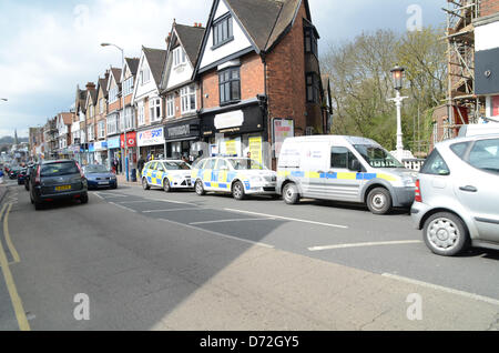 Tonbridge, Kent, UK. April 27th 2013: Witnesses have reported a suspected armed robbery at Thomson Travel Agents in Tonbridge, Kent. Police Officer on scene in Tonbridge High Street following suspected armed robbery. Police have not yet confirmed this. Credit: Duncan Penfold/Alamy Live News Stock Photo