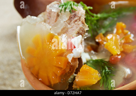 Aspic from meat decorated with egg, carrot, Stock Photo