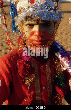 A hindu boy is made up and dressed like Hanuman, the monkey god ( India) Stock Photo