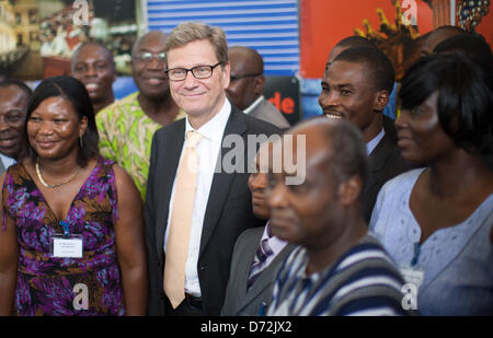 Accra, Ghana, 27 April 2013. German Minister of Foreign Affairs Guido Westerwelle stands between awardees in Goethe Institute in Accra, Ghana, 27 April 2013. PHOTO: MICHAEL KAPPELER/DPA/Alamy Live News Stock Photo