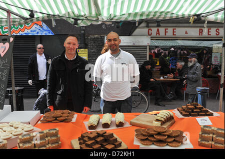 Brixton Market, London, UK. 27th April 2013.Two stallholders at the Brixton Bake Off. The Great Brixton Bake Off, 30 bakers present their finest cakes, biscuits and vegan bakes to a panel of judges. Credit: Matthew Chattle/Alamy Live News