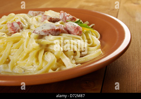 pasta Fettuccine Alfredo with sausage. close-up Stock Photo