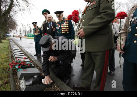 Braniewo , Poland 27th, April 2013 Soviet Army World War II veterans visits the biggest in Europe Soviet Soldiers cemetery in Braniewo to pay tribute to fallen Red Army friends in occasion of 68th anniversary of the end of World War II. Credit: Michal Fludra/Alamy Live News Stock Photo