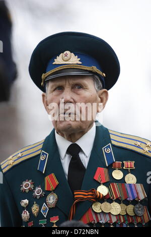 Braniewo , Poland 27th, April 2013 Soviet Army World War II veterans visits the biggest in Europe Soviet Soldiers cemetery in Braniewo to pay tribute to fallen Red Army friends in occasion of 68th anniversary of the end of World War II. Credit: Michal Fludra/Alamy Live News Stock Photo