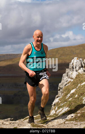Yorkshire Three Peaks Challenge Saturday 27th April, 2013. The 59th Annual 3 Peaks Race with 1000 fell runners starting at the Playing Fields, Horton in Ribblesdale, Nr, Settle, UK.  Pen-y-Ghent is the first peak to be ascended then Whernside and finally the peak of Ingleborough. The race timed using the SPORTident Electronic Punching system. Stock Photo