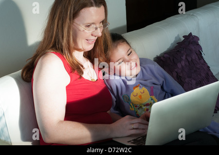 Mother and child with Laptop Stock Photo